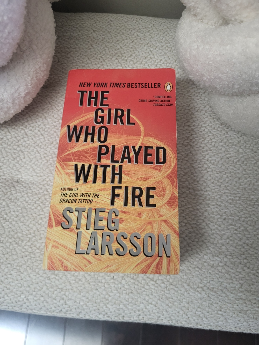 The Girl Who Played With Fire by Stieg Larsson - Orange/Yellow Paperback